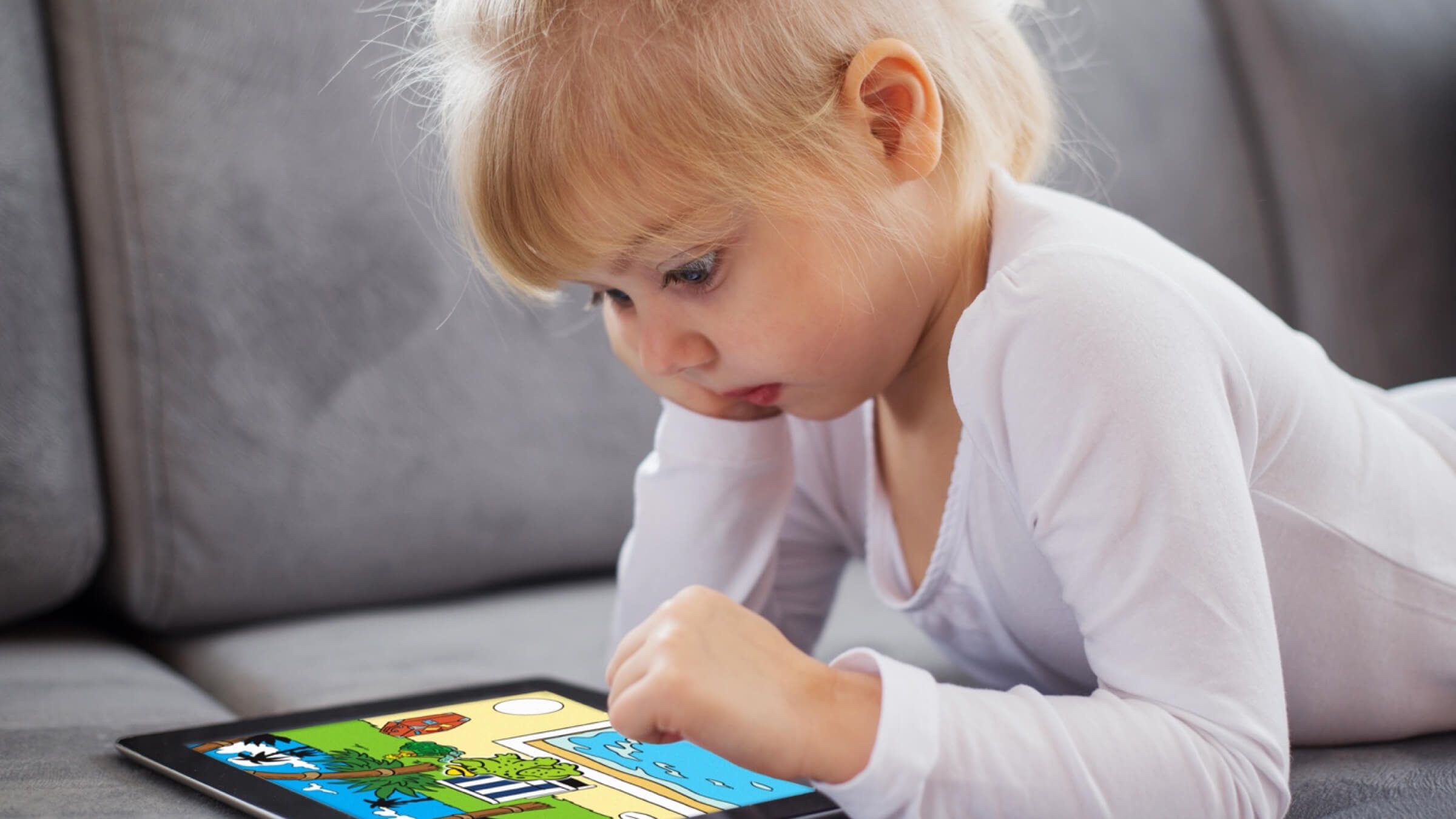 A child playing the Bamseklubben app on a tablet
